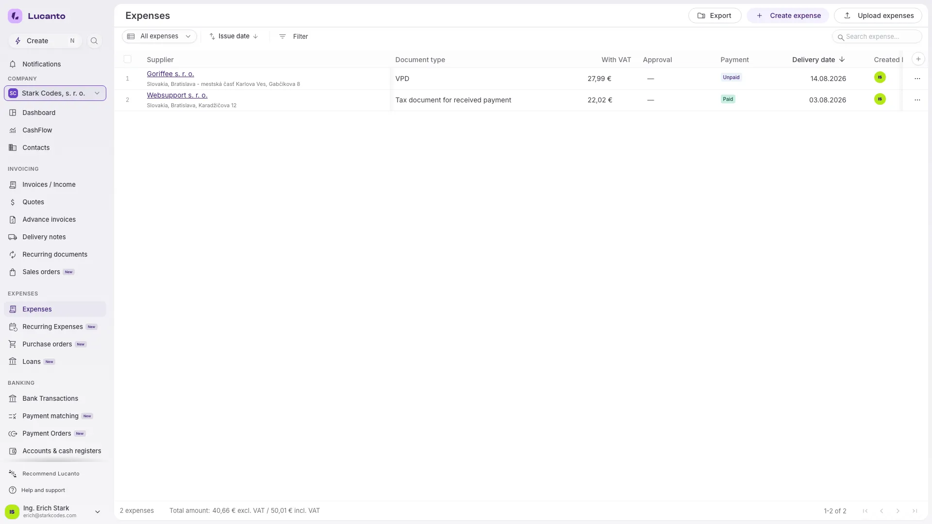 The expense list with two extracted documents and the Create expense and Upload expenses buttons in the header.